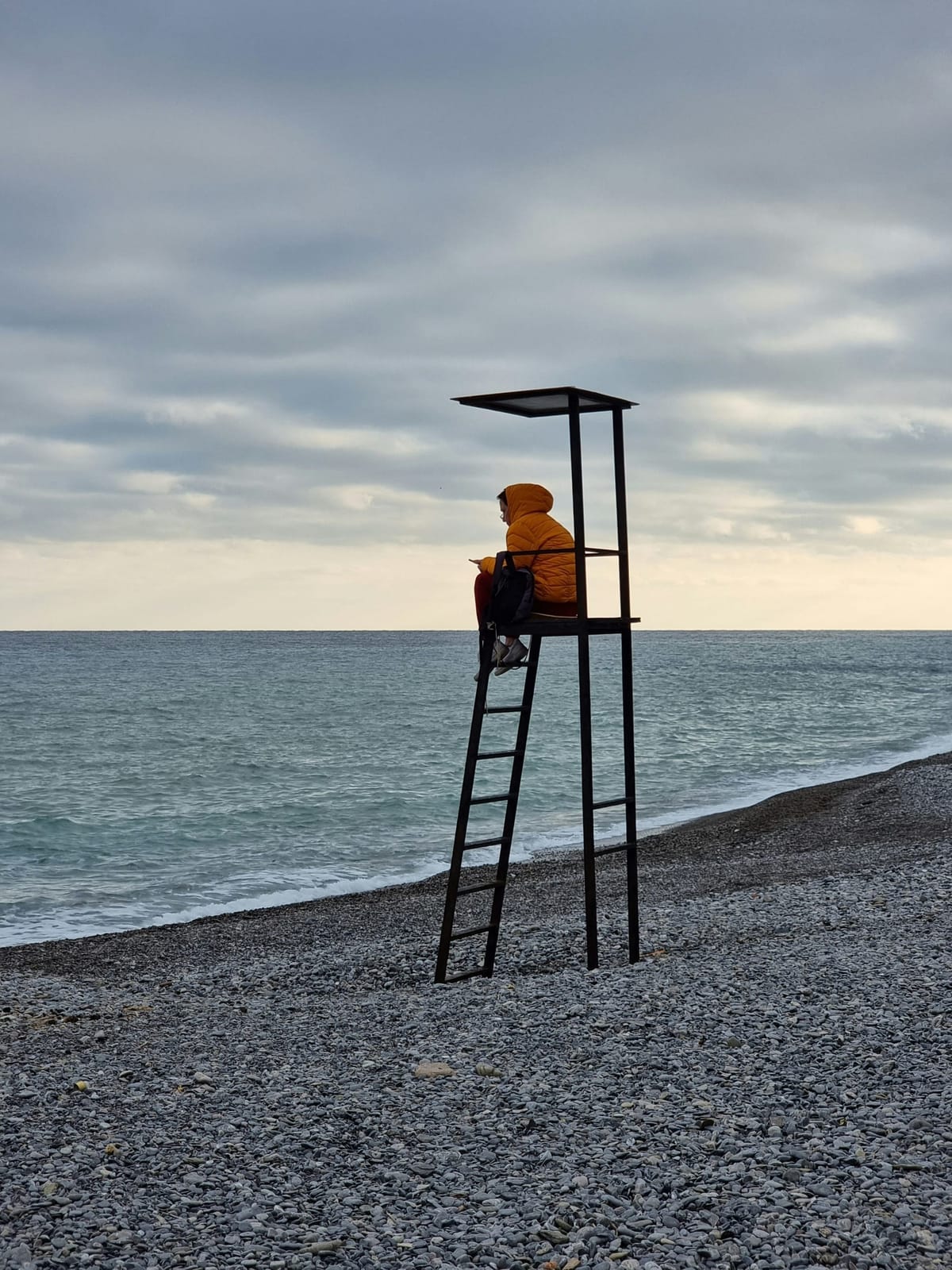 An employee working hard yet remaining unnoticed in the workplace.