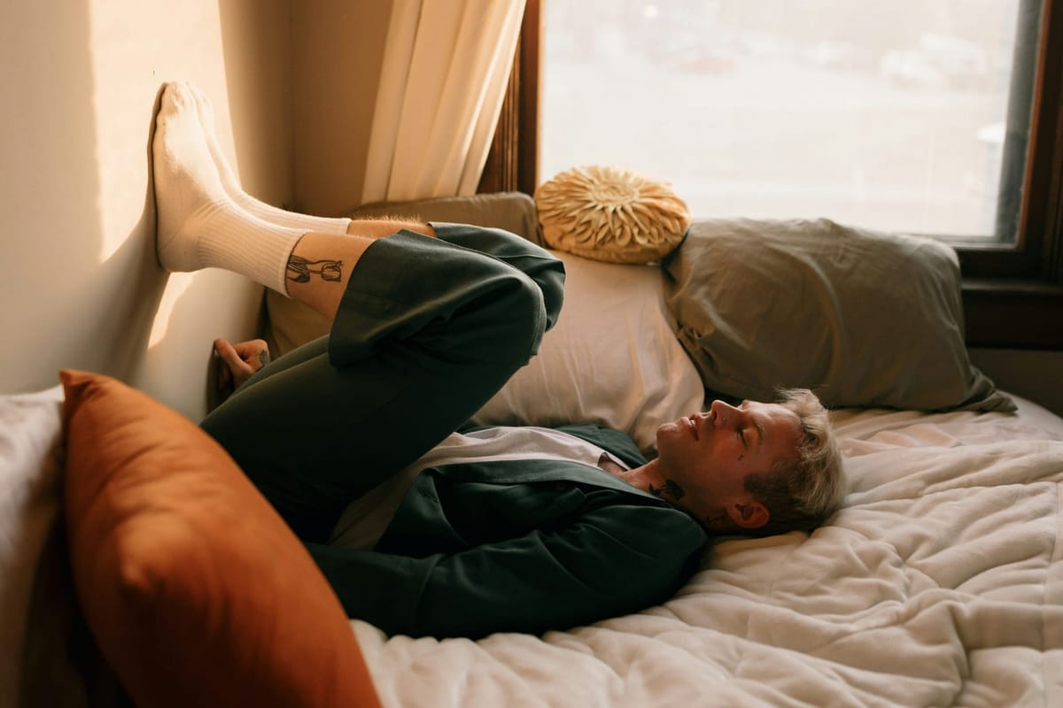 A peaceful bedroom scene illustrating the importance of healthy sleep habits for restoration.